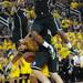 Michigan freshman Mitch McGary is fouled as he is swarmed by Michigan State freshman Denzel Valentine, freshman Matt Costell and freshman Gary Harris in the second half against Michigan State at Crisler Center on Sunday, March 3, 2013. Melanie Maxwell I AnnArbor.com